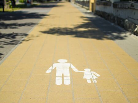Painted floor sign for pedestrian walking pathの写真素材