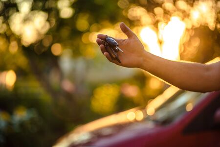 man hand holding car fobの写真素材