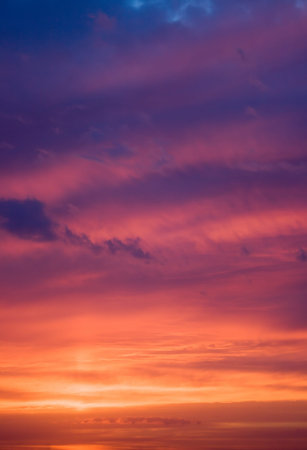 Photo of a sunset sky. The image can be applied as a background.
