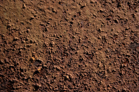 The detailed texture of corrosion on the painted metal surfaceの写真素材