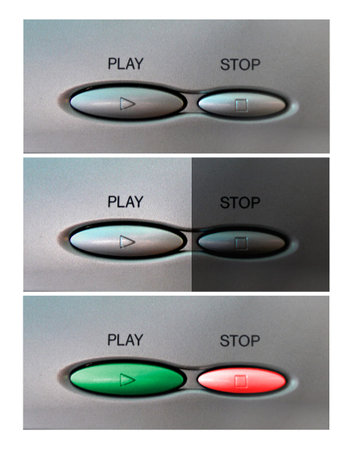 Photo of a part of the control panel of the electronic device with the image of buttons STOP and...