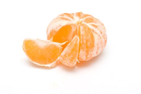 Tangerine without a peel on white. Isolation, macro.の写真素材