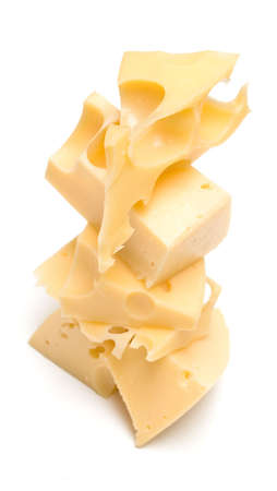 Some slices of cheese on white. The isolated image on white with a beautiful shadow.の写真素材