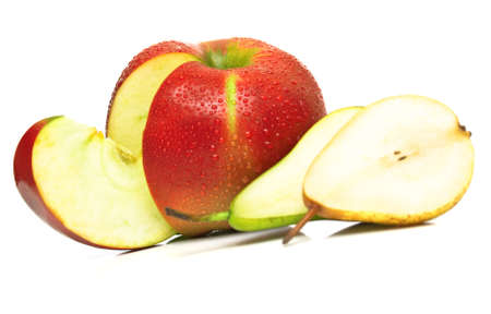 Juicy green pear and ripe red apple. Isolated, shallow DOF.の写真素材