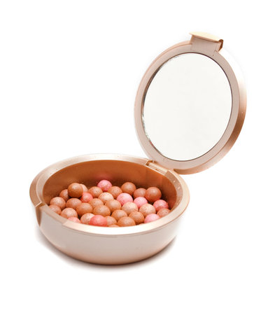 Blush in golden packing. Isolation on the whiteの写真素材