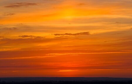 The evening sky during a sunset. Very effective background.の写真素材