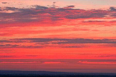 The evening sky during a sunset. Very effective background.の写真素材