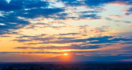 Wonderful sunset with the cloudy sky. Russia.の写真素材