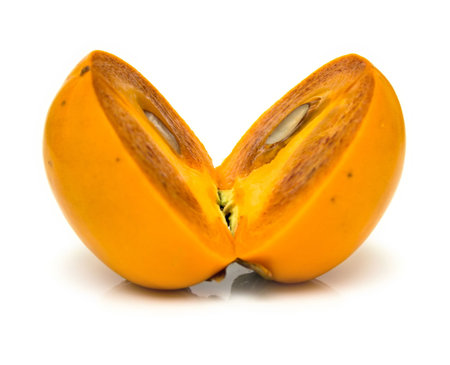 Ripe persimmon on a white backgroundの写真素材