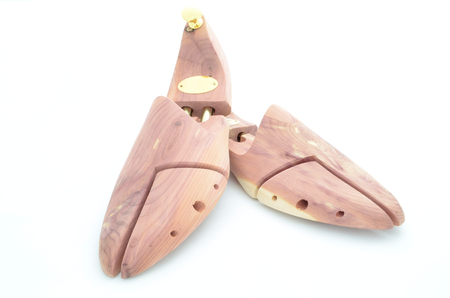 A pair of cedar wood shoe trees  These are luxury fashion accessories for men to keep the shoes in good shape の写真素材