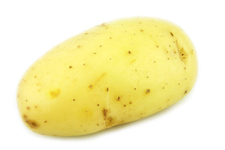 A bunch of potatoes Solanum tuberosum  on a white background の写真素材