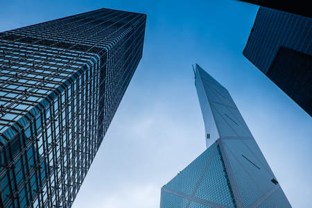 Glass and steel skyscrapers vertical in Hong Kongの写真素材