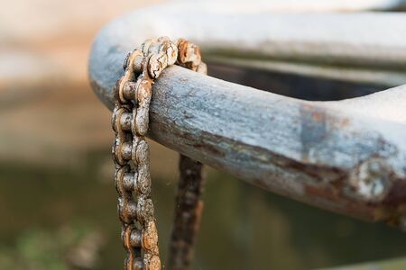 The chain used to lock the gear wheel that was used to pull the gate, not moving.の写真素材