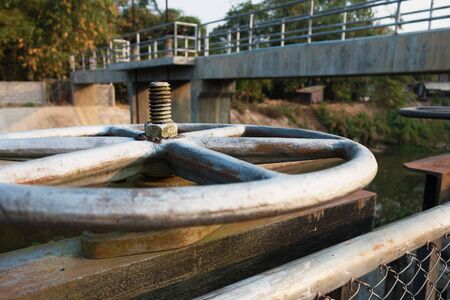 Water gate gear the old and rusty.の写真素材