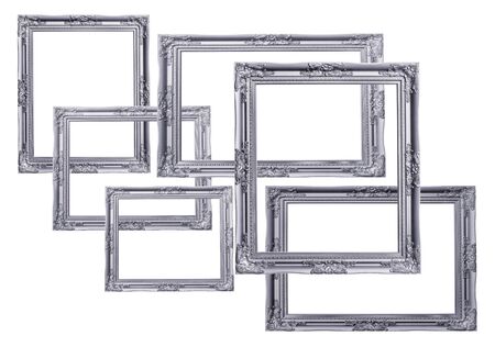 Pile of picture frames antique silver and black isolated on white background.の写真素材