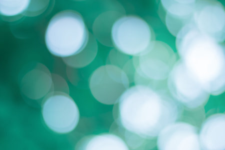 Abstract bokeh blue and green light from natural forests for background