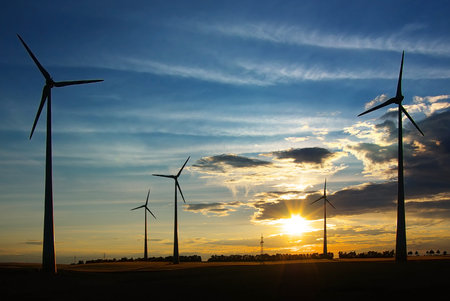 	Picturesque rural landscape with wind turbines.