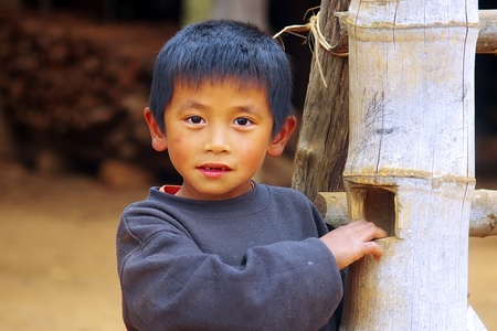 LAT SEN, LAOS- JANUARY 11: Portrait of a boy from the Lat Sen village near Plain of Jars. January 11, 2011 in Lat Sen,  Laosのeditorial素材