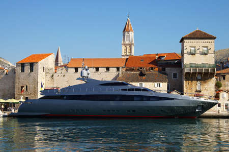Ancient city and the modern yacht in a Trogir city, Croatiaの写真素材