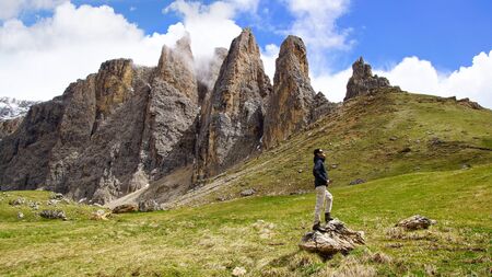 Picturesque Dolomites landscape with the tourist.  Italyの写真素材