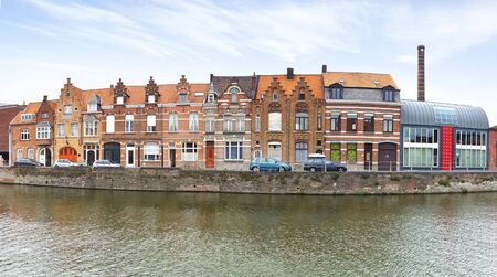 Panoramic view over the Canal, houses and bridges in Bruggeの写真素材