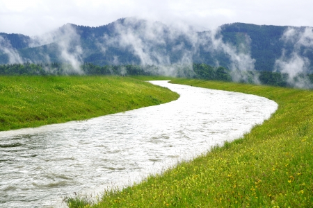 Picturesque rural mountain rural landscape with river の写真素材