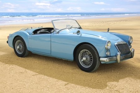 Picturesque seascape with retro - style car.のeditorial素材