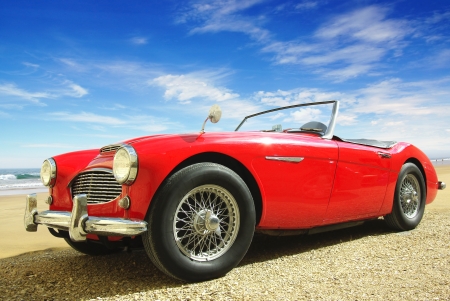 Picturesque seascape with retro - style car.の写真素材
