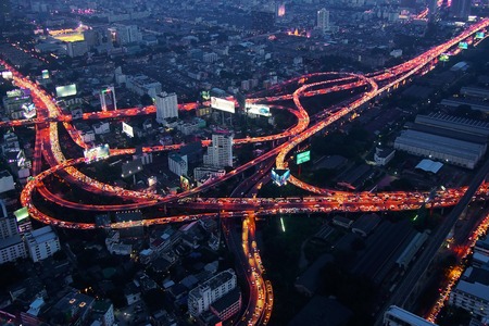 Night in Bangkok, Thailand. Cityscape with roads.