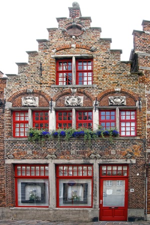 The historic building along the Genthof. Bruggeのeditorial素材