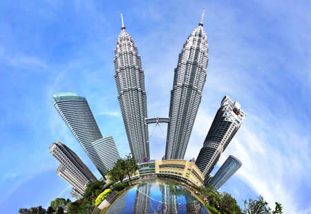 KUALA LUMPUR, MALAYSIA - FEBRUARY 01, 2014: Petronas Towers. Petronas Towers, also known as Menara Petronas is the tallest buildings in the world from 1998 to 2004.のeditorial素材