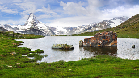 The beautiful mountain landscape with Stellisee lake. Switzerland.の写真素材