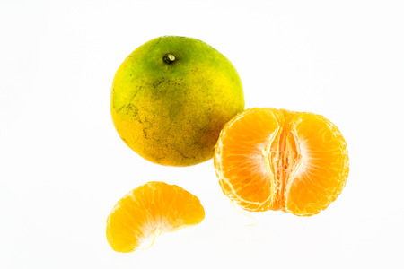 Mandarin orange peeled in halfの写真素材