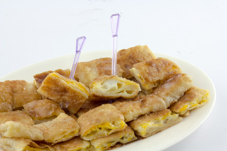 crispy pancake named -roti-,fr ied bread with butter and eggの写真素材
