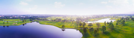 Aerial view of golf field landscape with sunrise view in the morning shot. Bangkok Thailandの写真素材