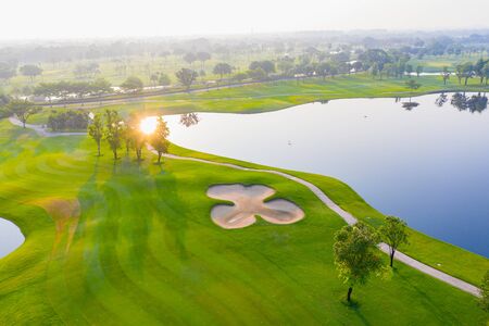 Aerial view of golf field landscape with sunrise view in the morning shot. Bangkok Thailandの写真素材
