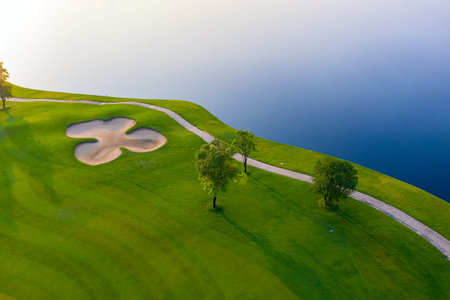 Aerial view of golf field landscape with sunrise view in the morning shot. Bangkok Thailandの写真素材