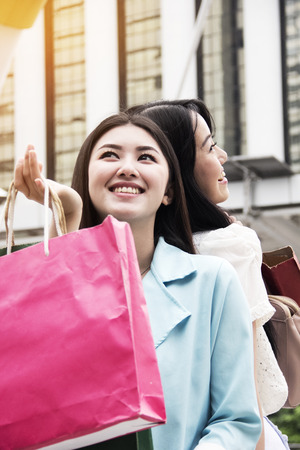 Beautiful Asia Women are online shopping and get discount promotion sales.の写真素材