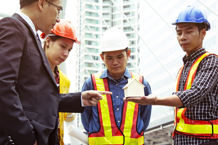 Engineering holding home construction work concept.の写真素材