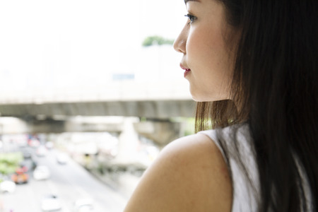 Close-up Beautiful woman happy smile and looking in the city.の写真素材