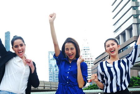 Beautiful business women happy, smile portrait and offices building background.の写真素材