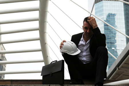 Business man sadness and thinking on walking street.の写真素材