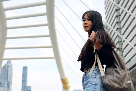 Beautiful woman sadness and thinking traveling in the capital city.の写真素材