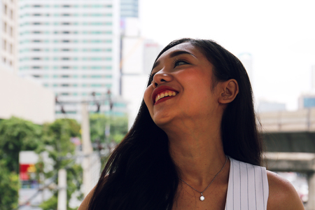 Beautiful Asia woman business smile portrait at outdoor and traveling in the capital city.の写真素材
