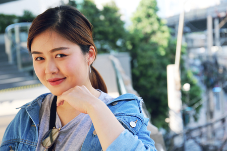 Beautiful Asia woman smile portrait and traveling in Bangkok city.の写真素材