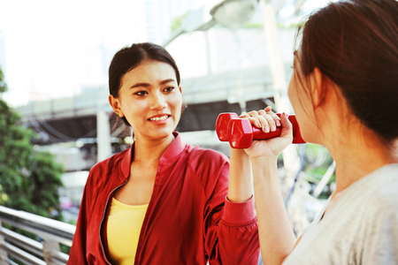 Beautiful two sport woman talking healthy concept;の写真素材