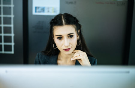 Close-up business woman working on desk in the office