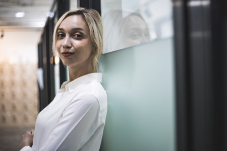 Beautiful business woman smile portrait and standing in the offices.