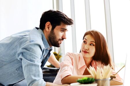 Happiness young couple working from home and stay home for protection from corona virus.の写真素材