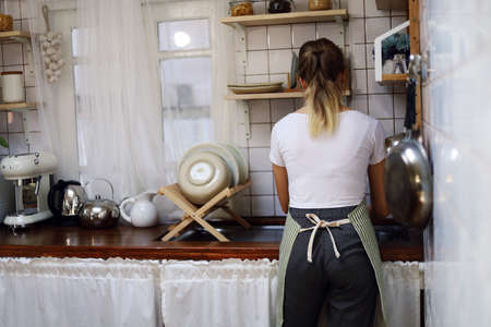 Happiness young couple lover fun and cooking food for breakfast in kitchen.の写真素材